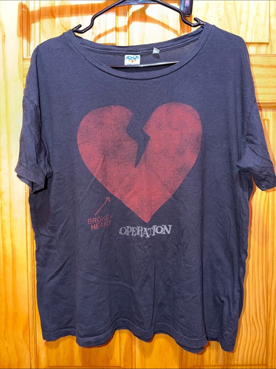 Junk Food Clothing Tops - Junk Food Clothing Black Tee with Red Broken Heart Graphic and 'Operation' Text